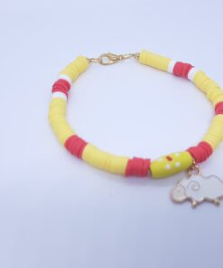 Yellow bracelet with cheep charm