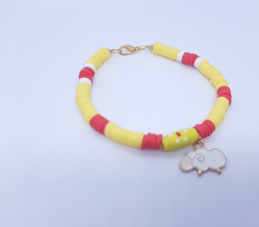 Yellow bracelet with cheep charm